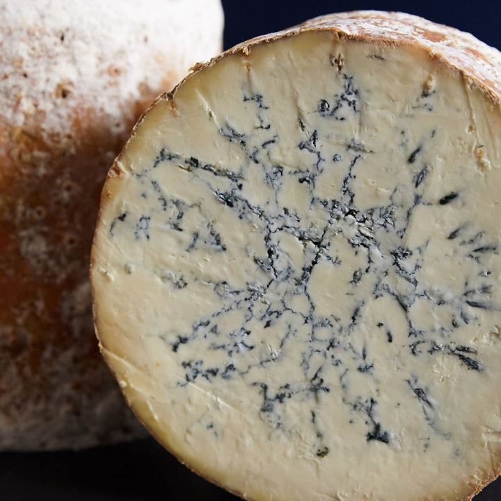 Colston Bassett Stilton cheese showing creamy paste and delicate blue veining