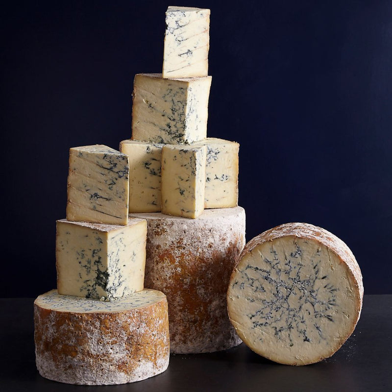 Colston Bassett Stilton cheese showing creamy paste and delicate blue veining